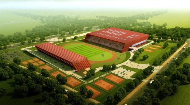 体育中心草坪施工,足球场草皮维护过程