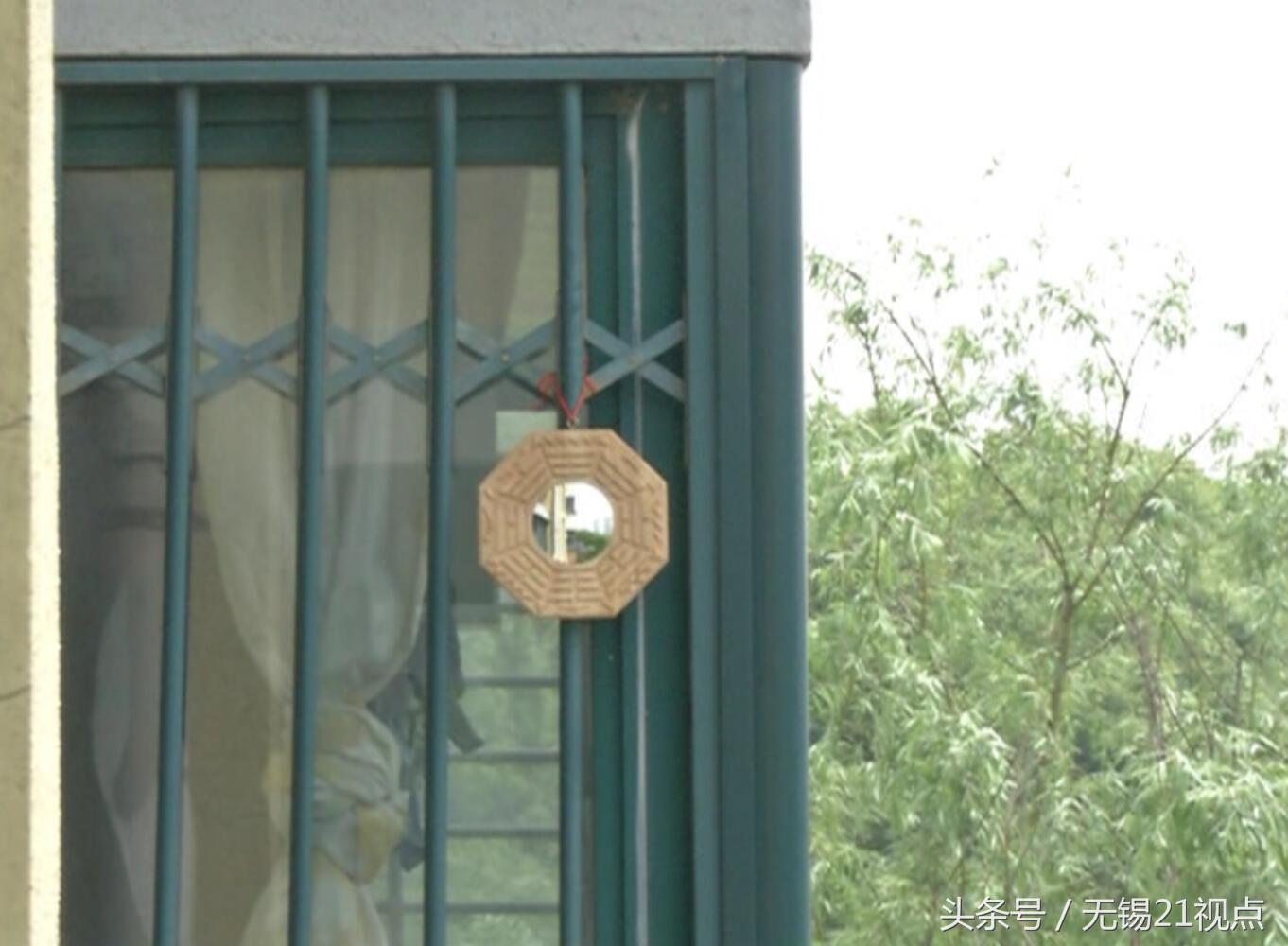 八卦镜子挂门口有什么讲究,八卦镜对门怎么处理