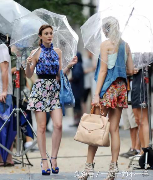 一把伞撑出花花世界，不开劳斯莱斯雨中照样傲娇走