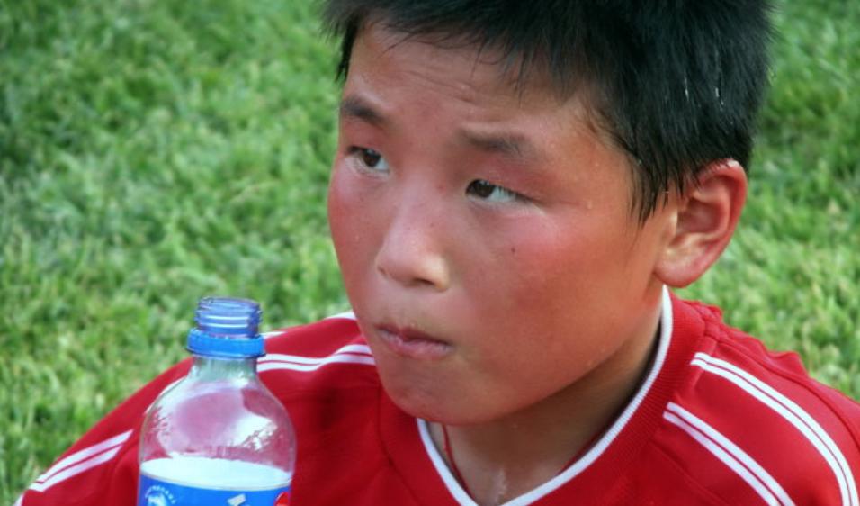 人民日报谈足球水平,人民日报足球