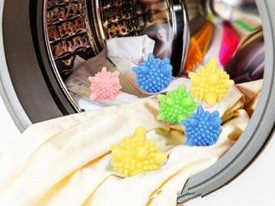 衣服在洗衣机里总是打结,洗衣机里的衣服打结怎么处理