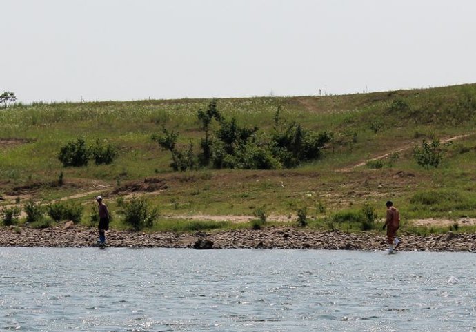 中朝边境美丽的风景,中朝边境桃花盛开的地方