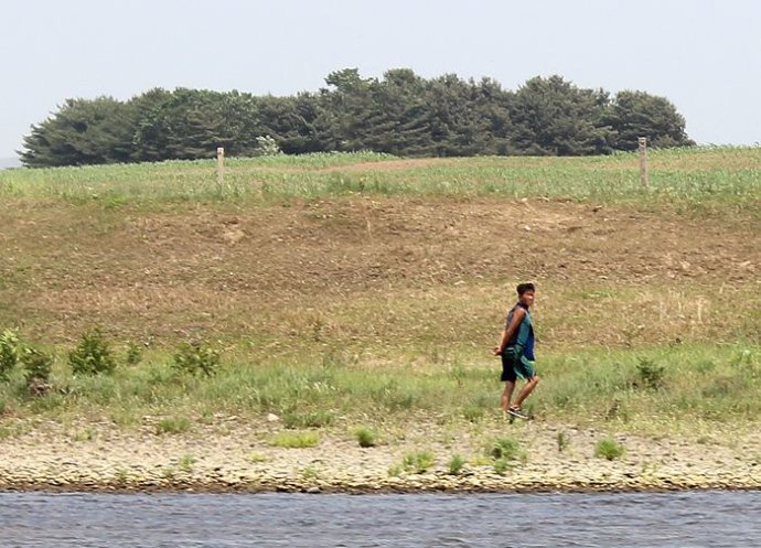中朝边境美丽的风景,中朝边境桃花盛开的地方