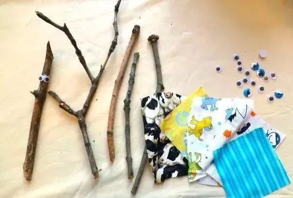 幼儿园用干树枝做成的手工,树枝创意100种手工画幼儿园