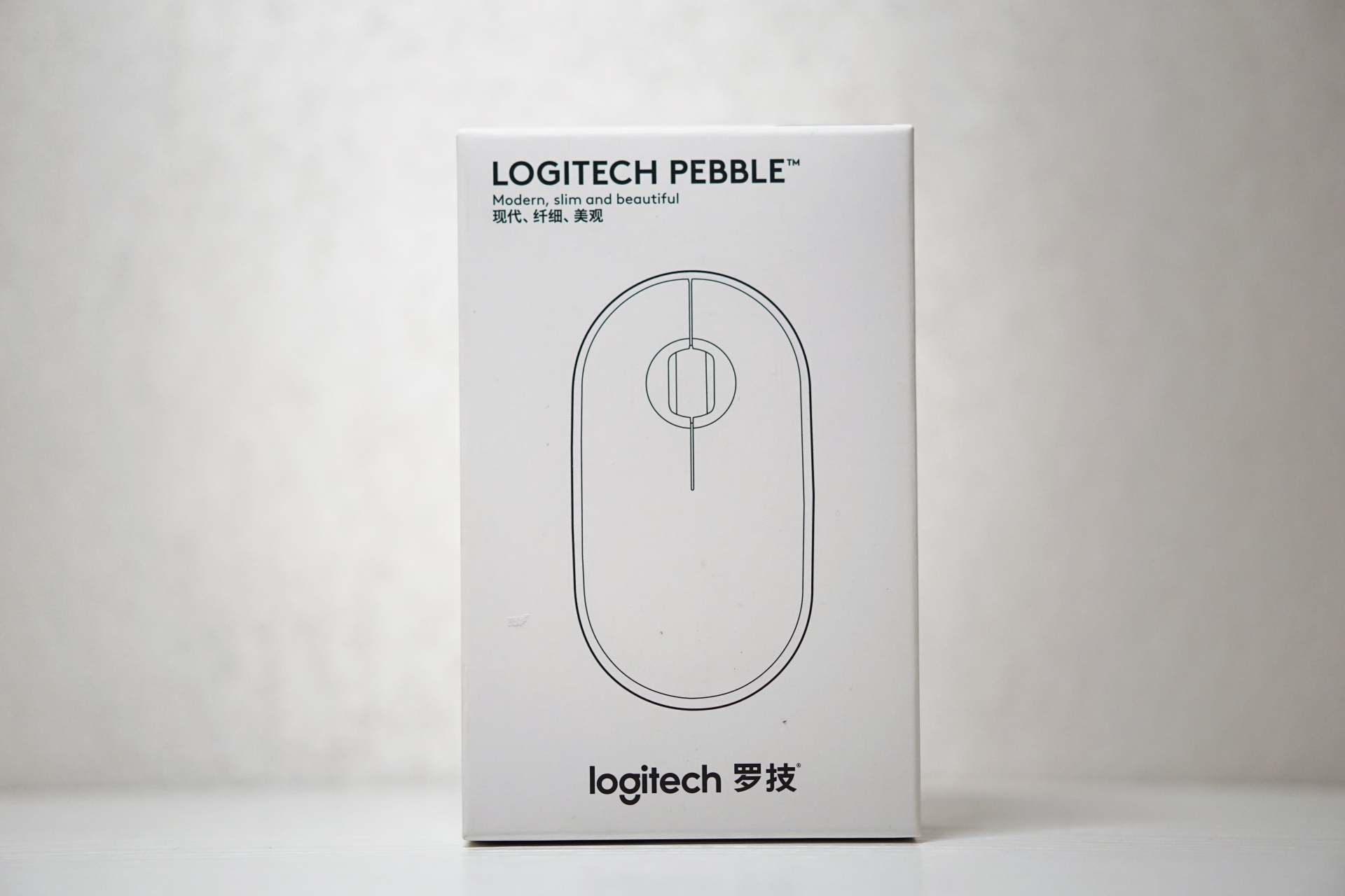 罗技无线鼠标pebble怎么切换蓝牙,罗技鼠标pebble如何连ipad