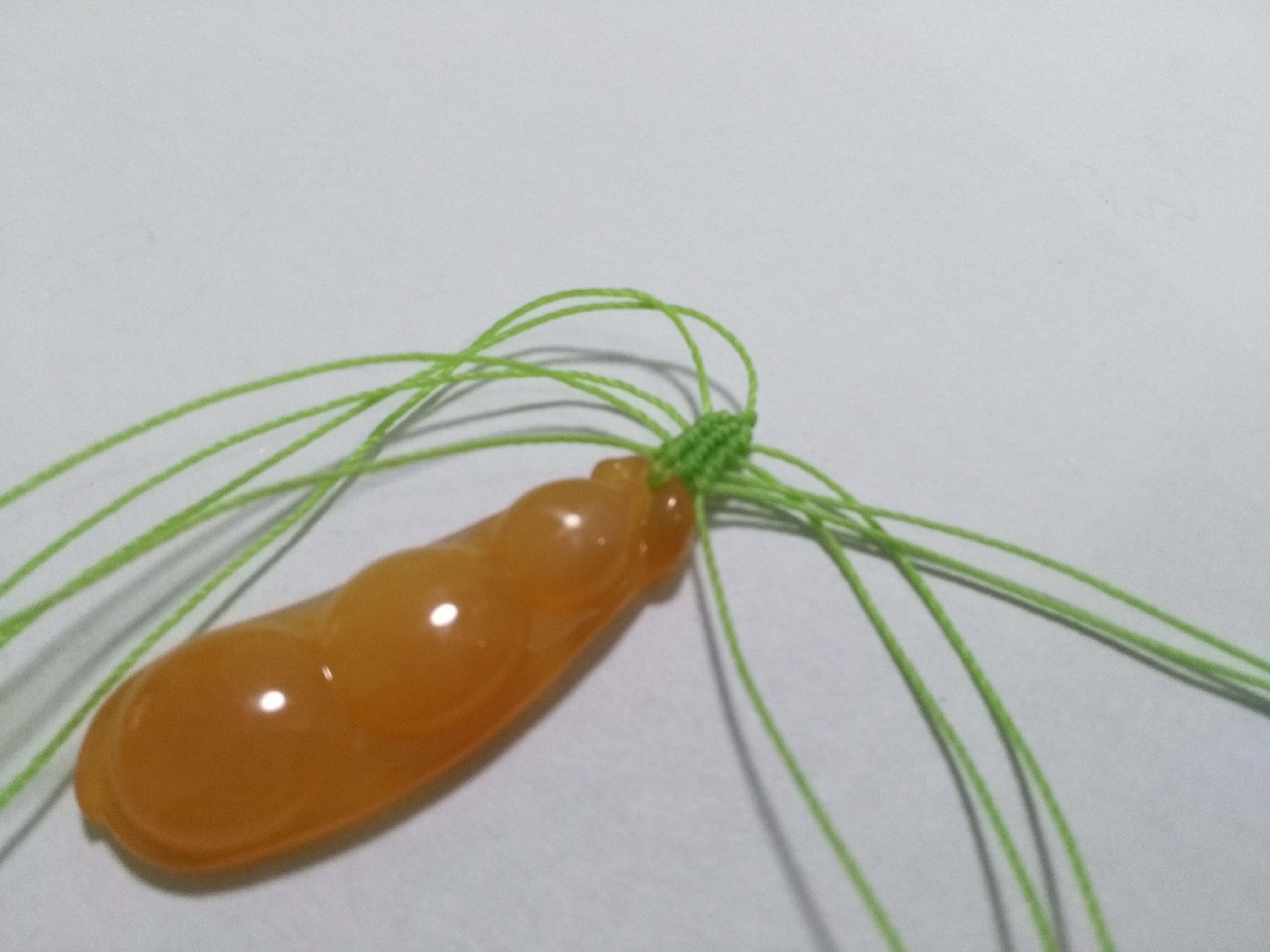 玛瑙豆子编手机吊坠法教程,玉豌豆吊坠怎么编绳