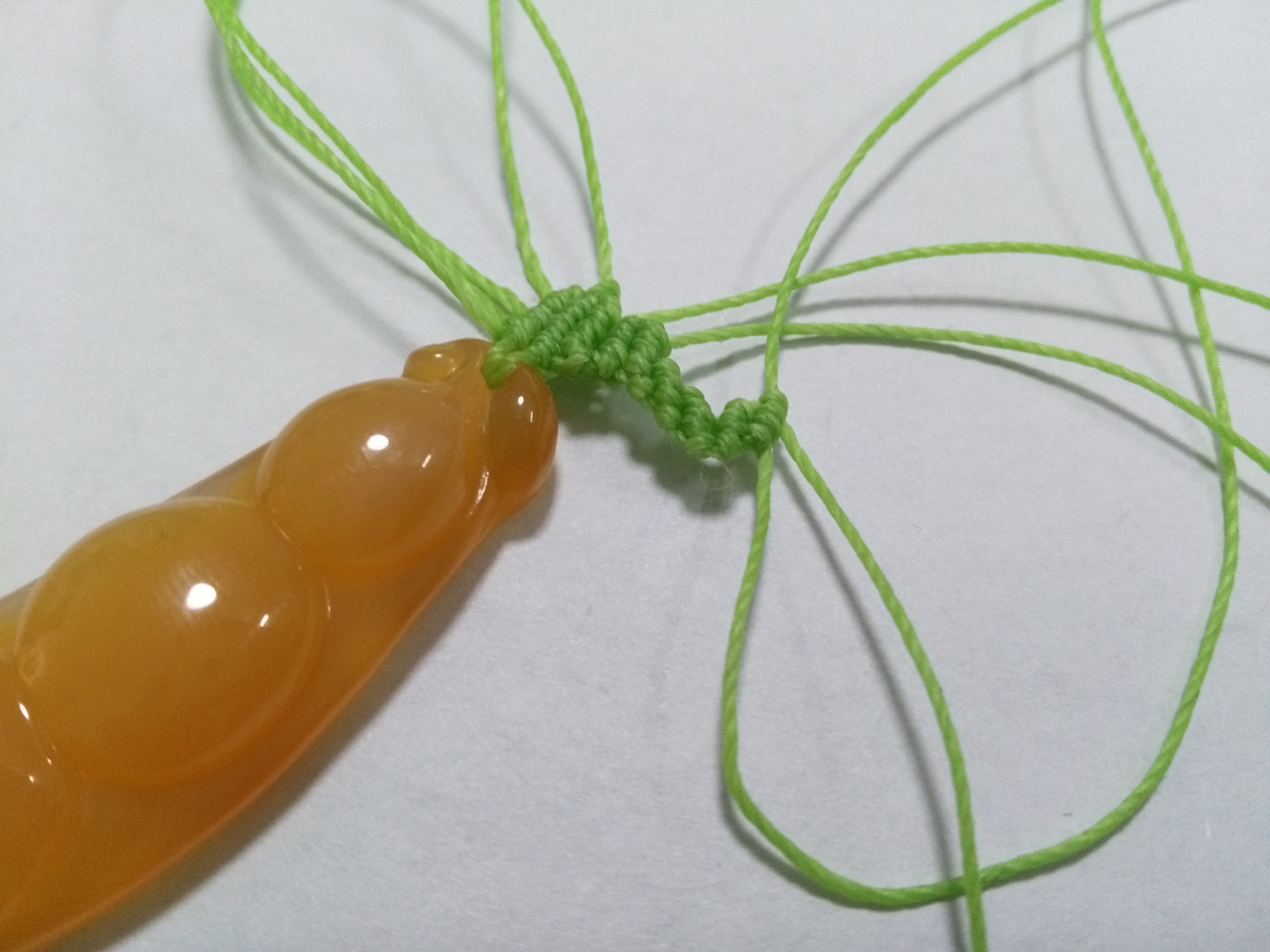 玛瑙豆子编手机吊坠法教程,玉豌豆吊坠怎么编绳