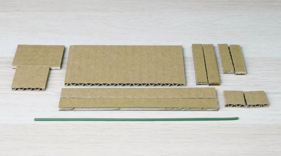 怎么用纸板制作电脑小子玩具,用纸板做的棍子玩具