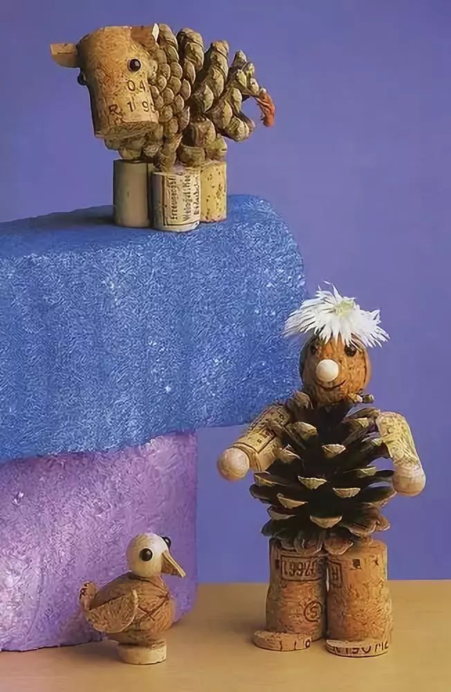 用松塔做的创意吊饰,松塔加树枝创意手工吊饰