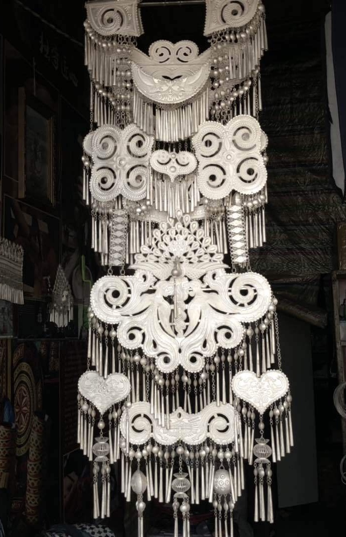 彝族银饰加工过程,凉山彝族银饰手工技艺