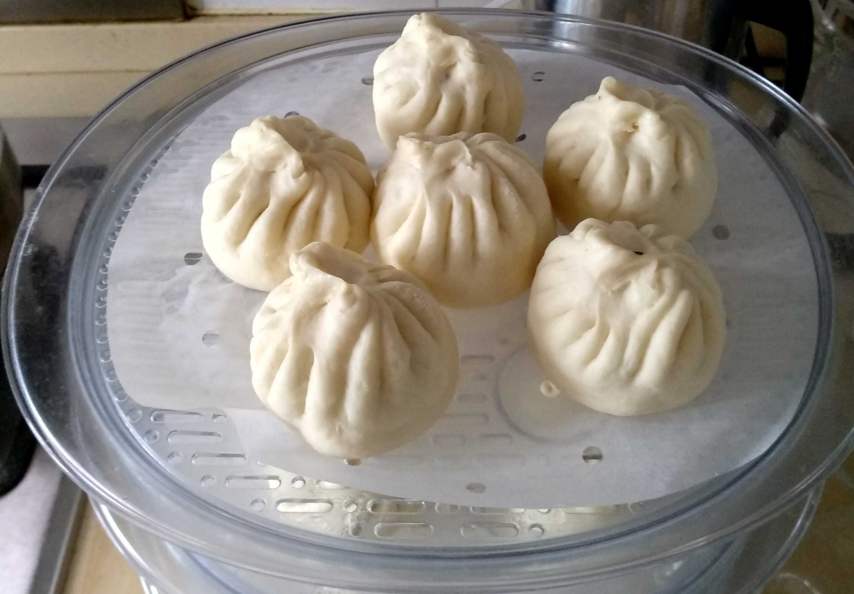 包子馒头蒸出来底部发硬,包子馒头蒸好后怎么保持松软