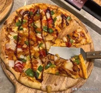 #吃遍大连#披萨的诱惑!一个蕴藏着芝士力量的神物