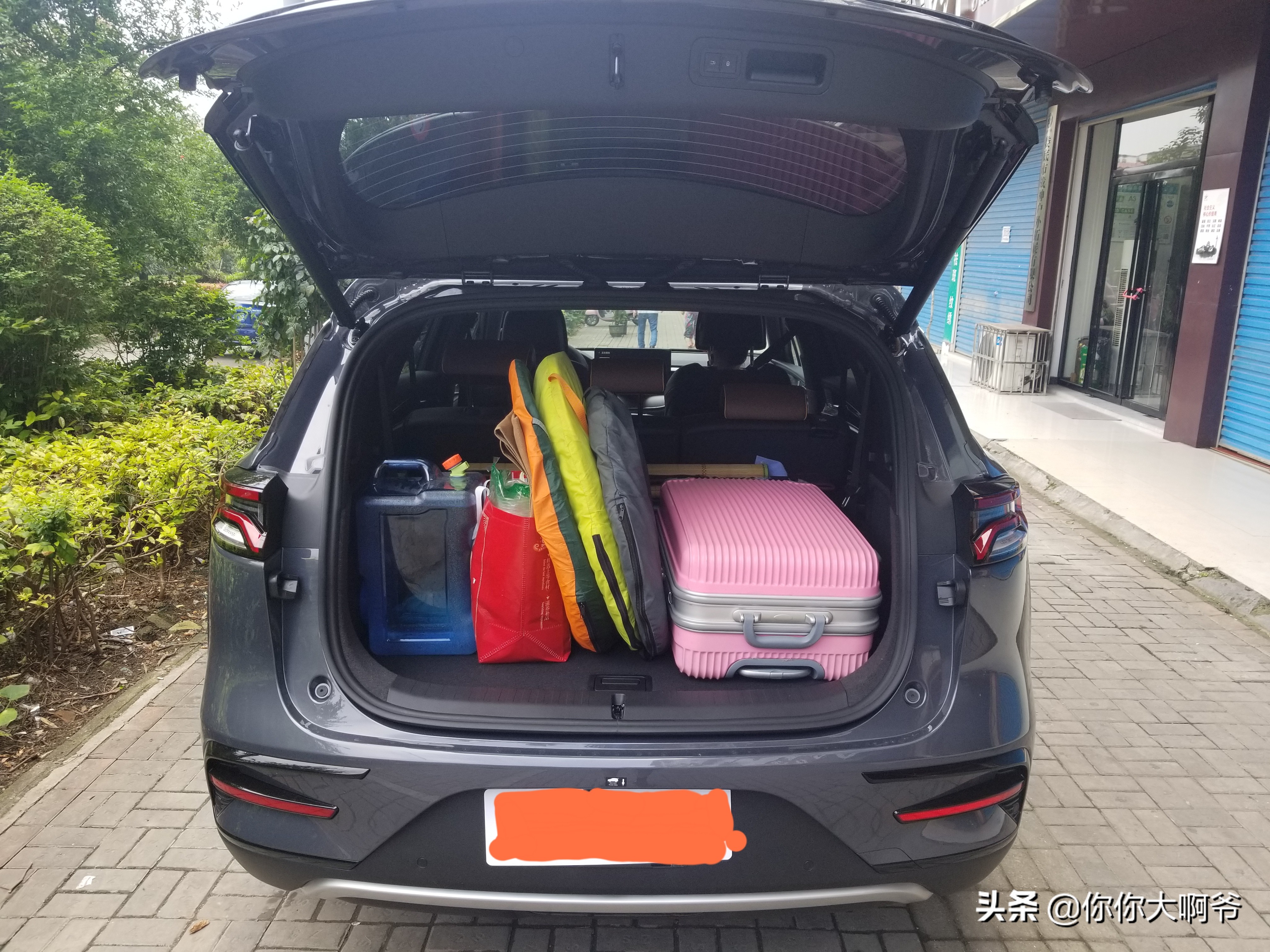 比亚迪唐dmi112km尊荣版赤地红,唐dmi冠军版200km尊享型评测