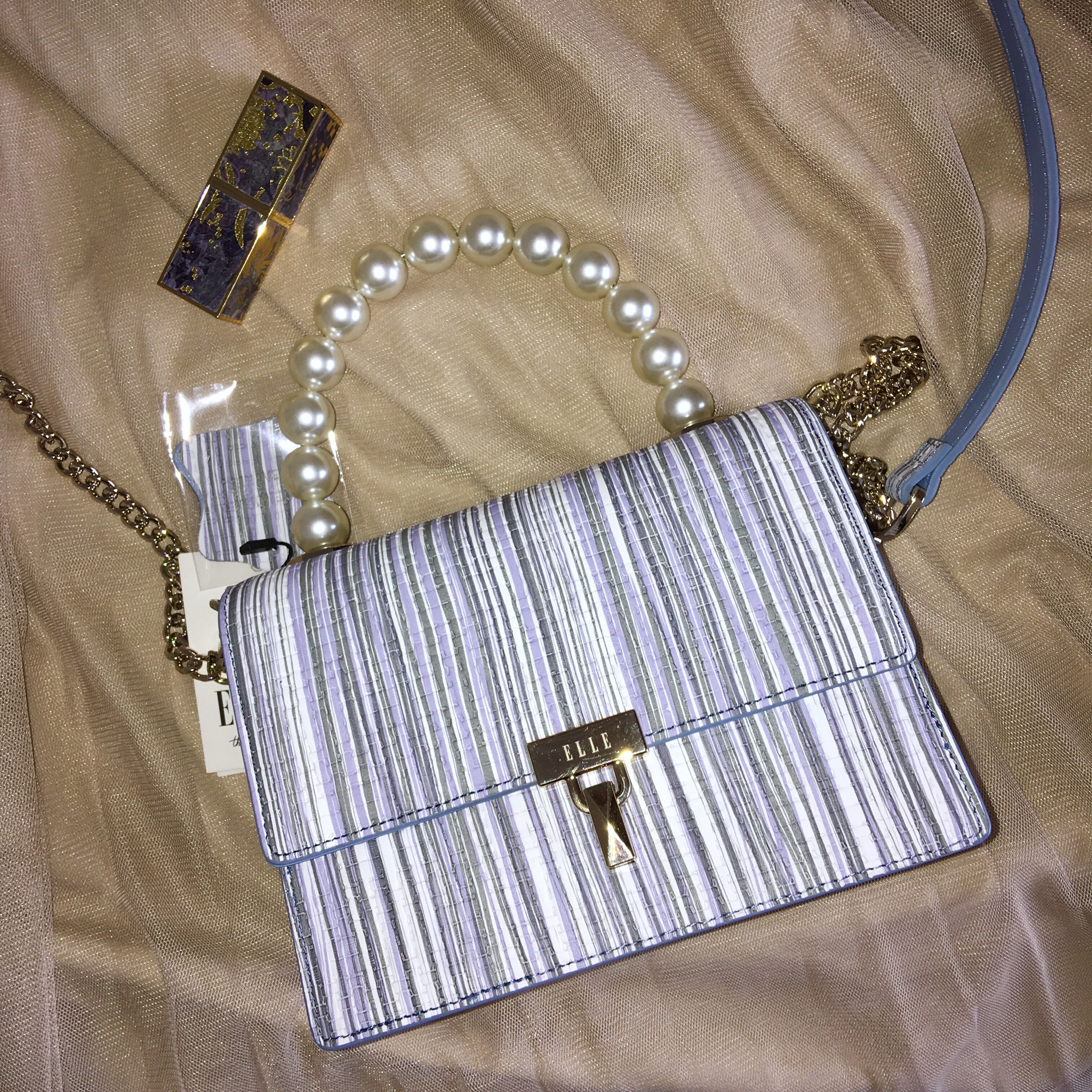 elle粉色包包搭配,elle包包怎么便宜了