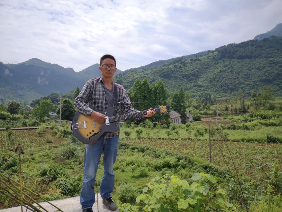 张家界吉他手工制作,张家界手工吉他