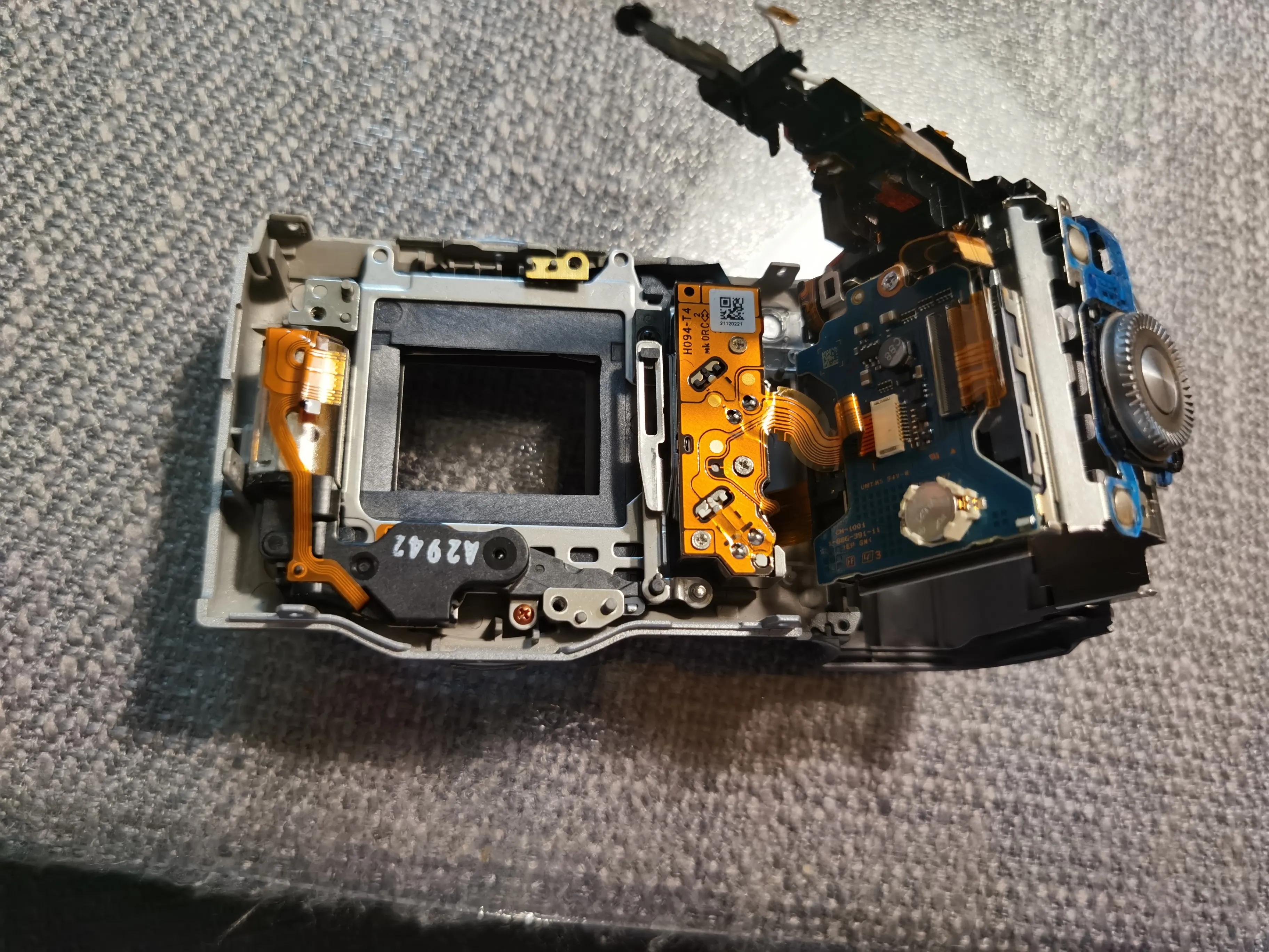 索尼相机更换快门组件,索尼微单相机电池盖拆卸教程