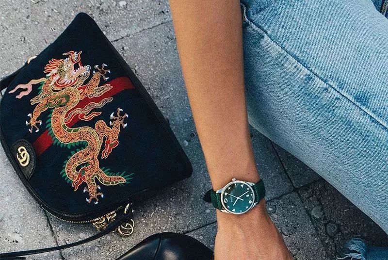 gucci设计理念是什么,gucci品牌标志性设计元素