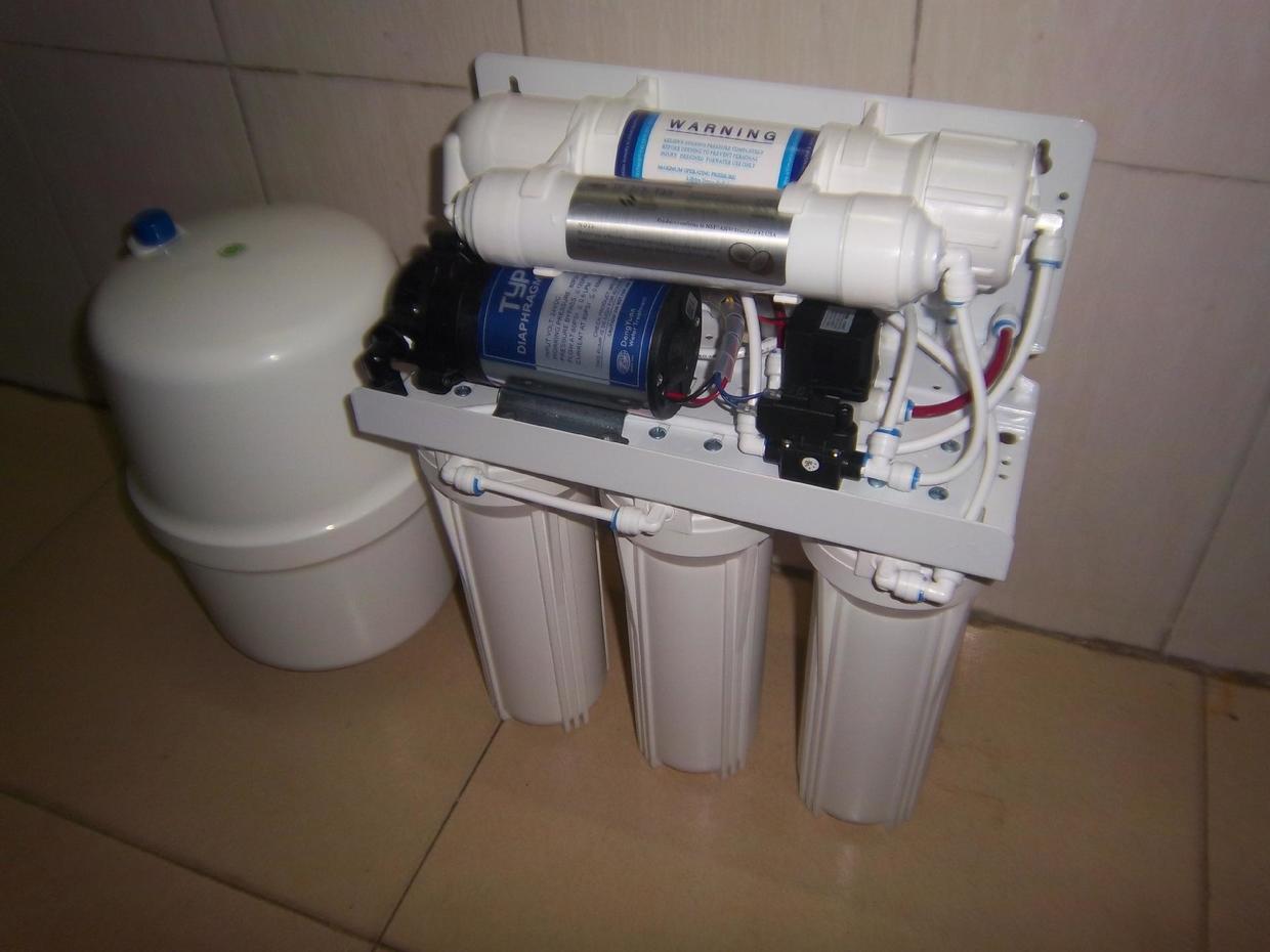 饮水机上的脏东西怎样清除,饮水机长时间没用怎么清洗才干净