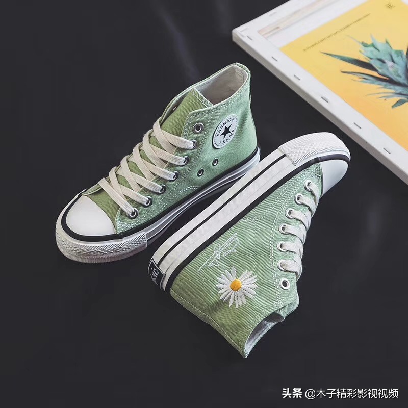 今年超火女板鞋黑色平底,女款个性帆布女鞋高帮