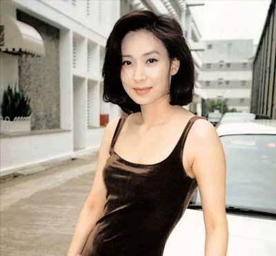 邝美云和周大福的关系,邝美云是如何成为亿万富婆的