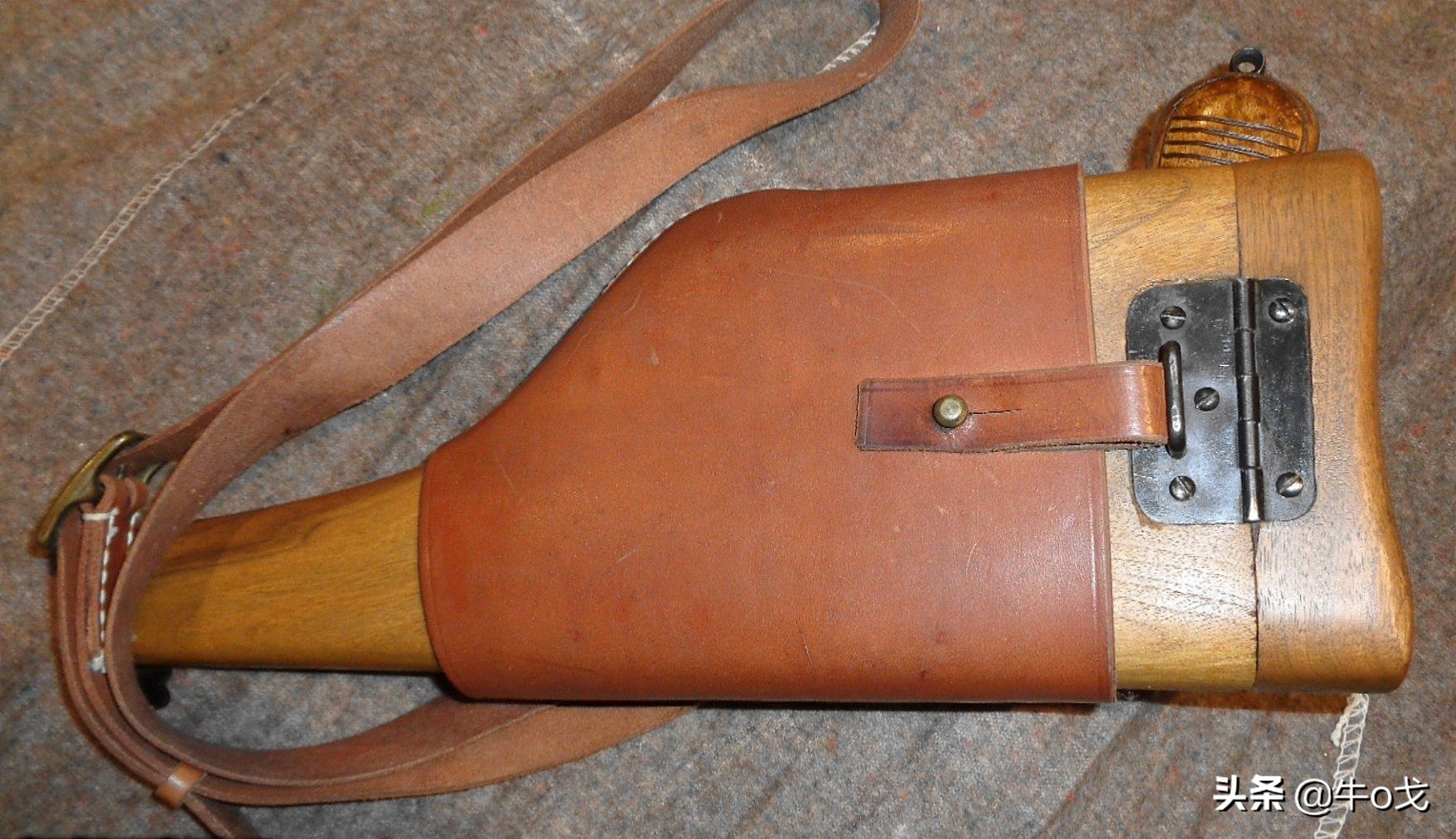 驳壳枪枪托是什么材质,驳壳枪木质套和皮套的区别