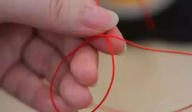 手编绳吊坠怎么打结,四股手编绳打结收尾