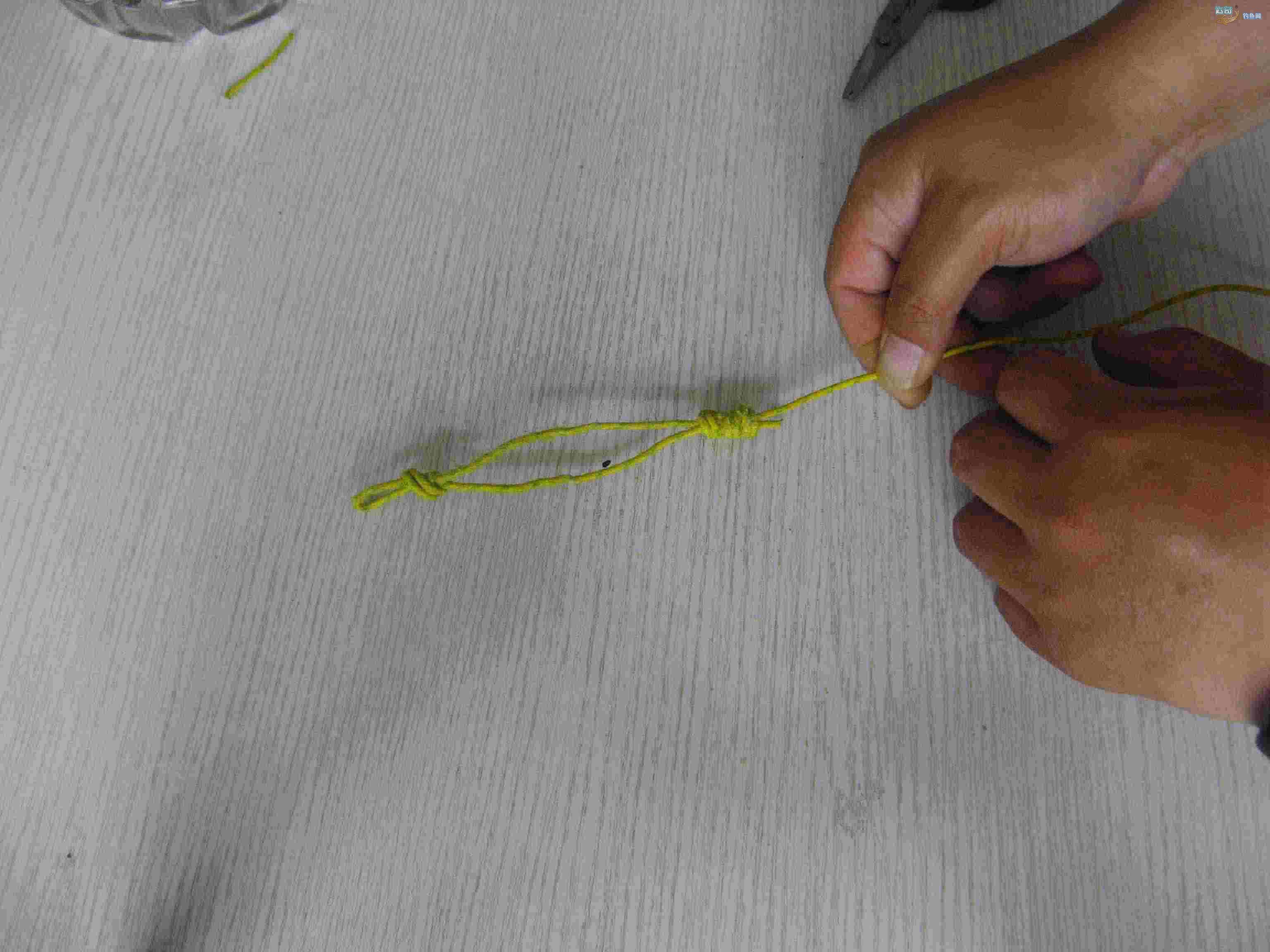 鱼竿稍和主线打结,鱼竿怎么打马蹄环