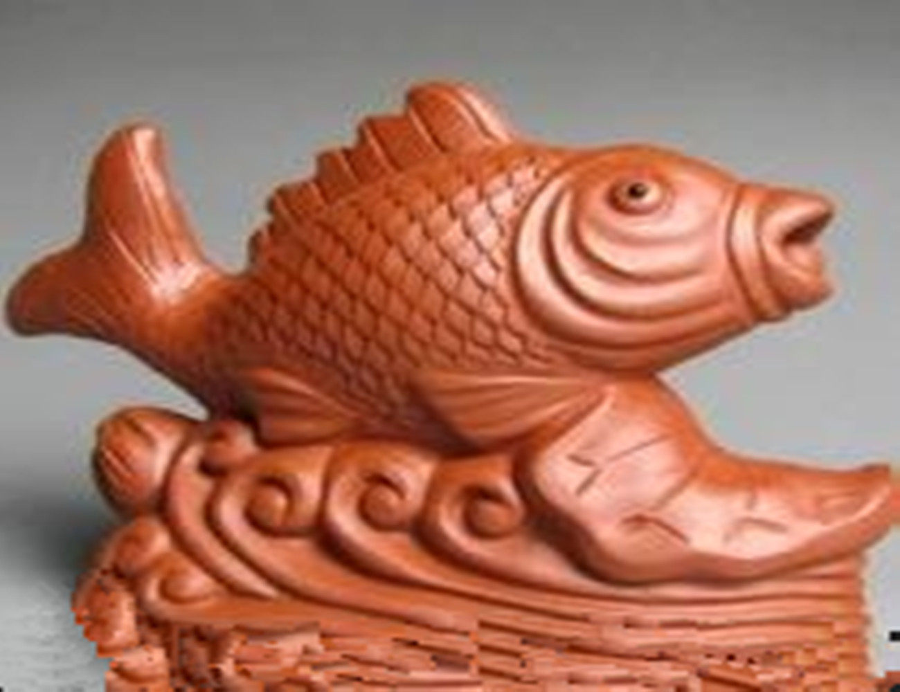 小小的茶宠：茶盘之上，茶汤润之，活灵活现，寓意吉祥，赏心悦目