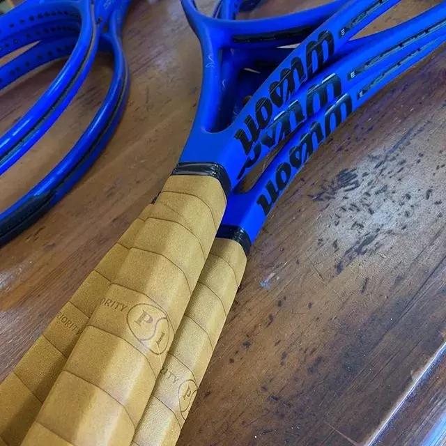 费德勒穿网眼,费德勒秀拍框颠球