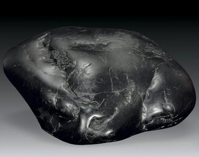 一块墨玉原石多少钱,这块翡翠原石值多少