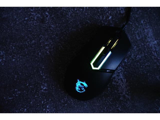 看样子就很有料，这个自带龙纹身的鼠标果然很不一般