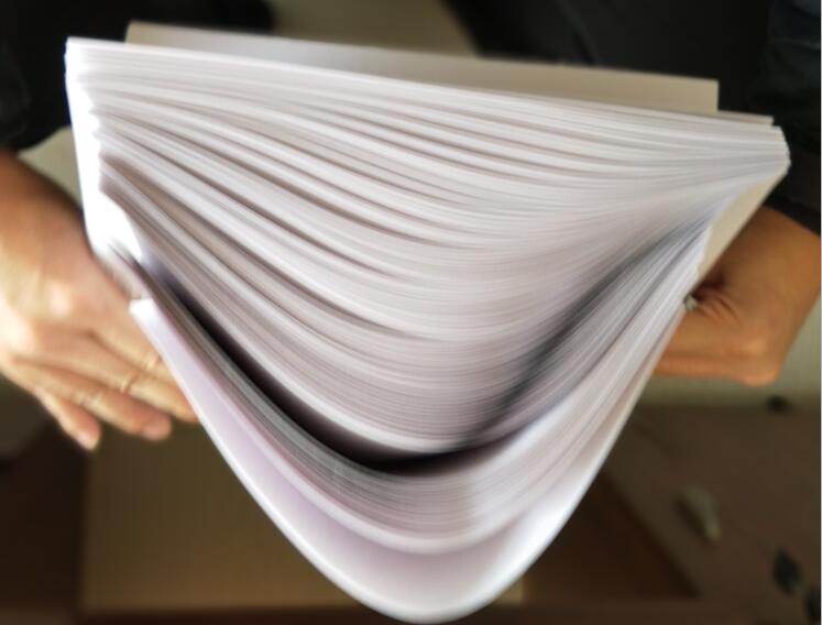 打印机一次出来很多张纸怎么设置,打印机同时出两张纸怎么解决