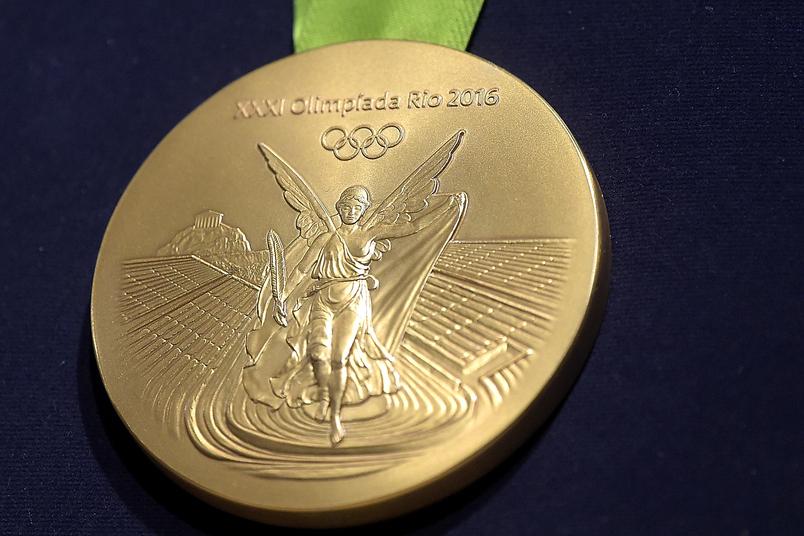 东京奥运金牌是纯金的吗有多重,日本东京奥运金牌多重