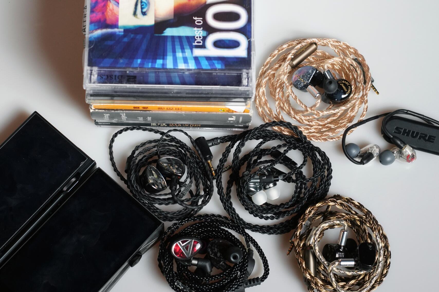 聊一下我喜欢的摇滚音乐以及适合听摇滚的耳机，*放播**器