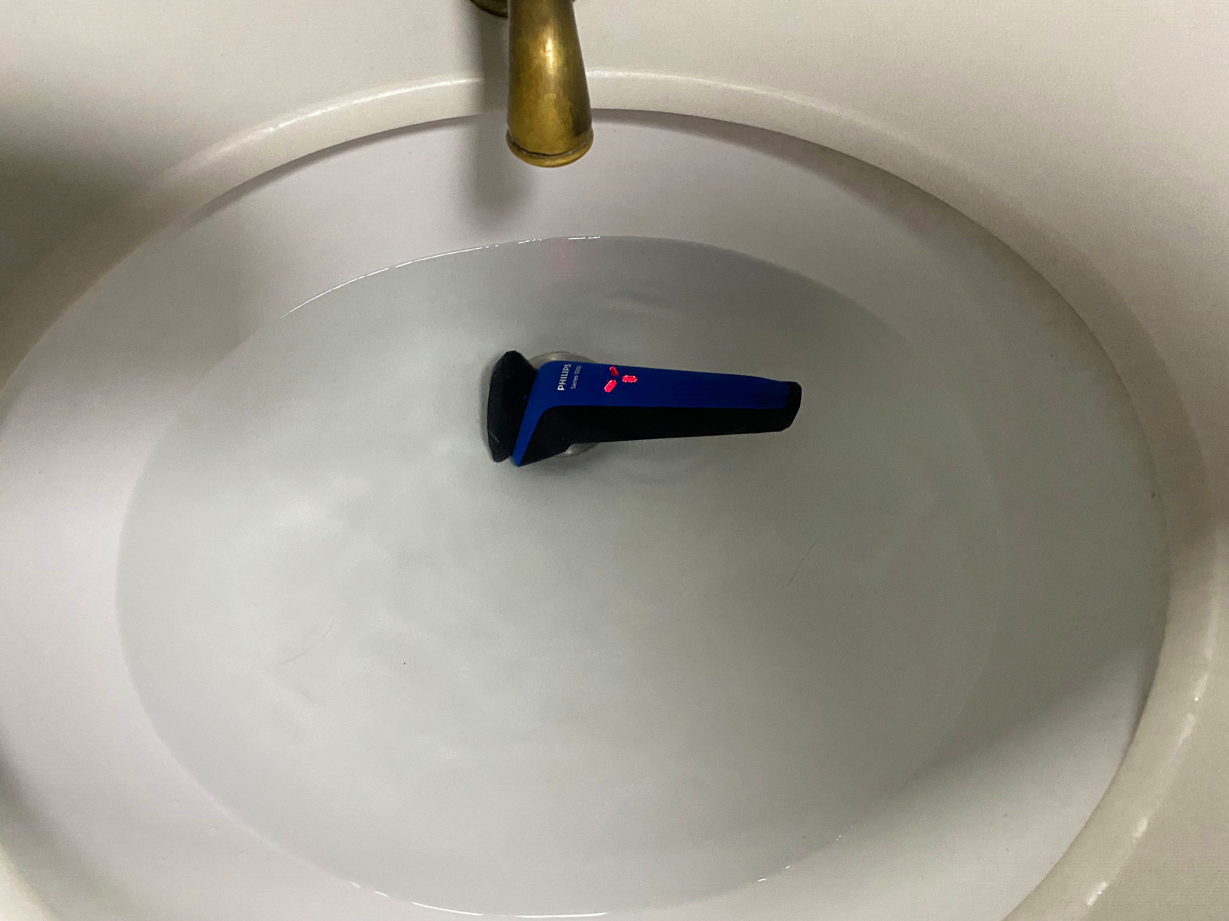 东京飞利浦小旋风剃须刀,飞利浦剃须刀清洗水