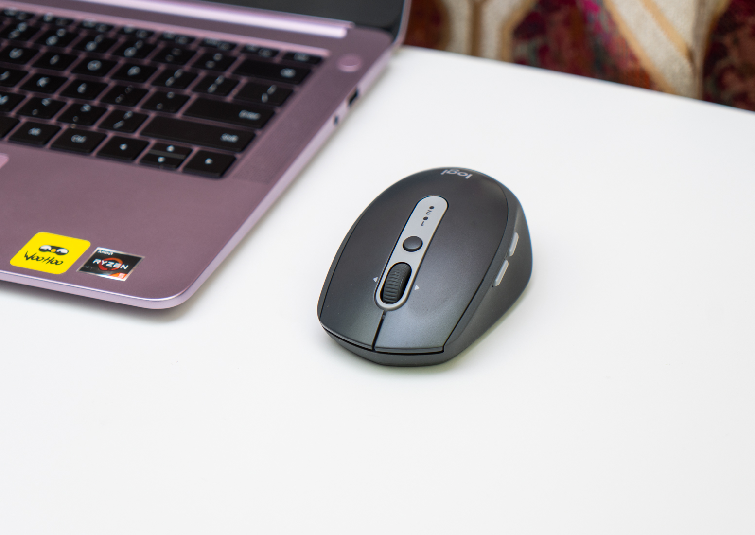 罗技m590鼠标如何设置功能键,罗技m590鼠标完全拆解