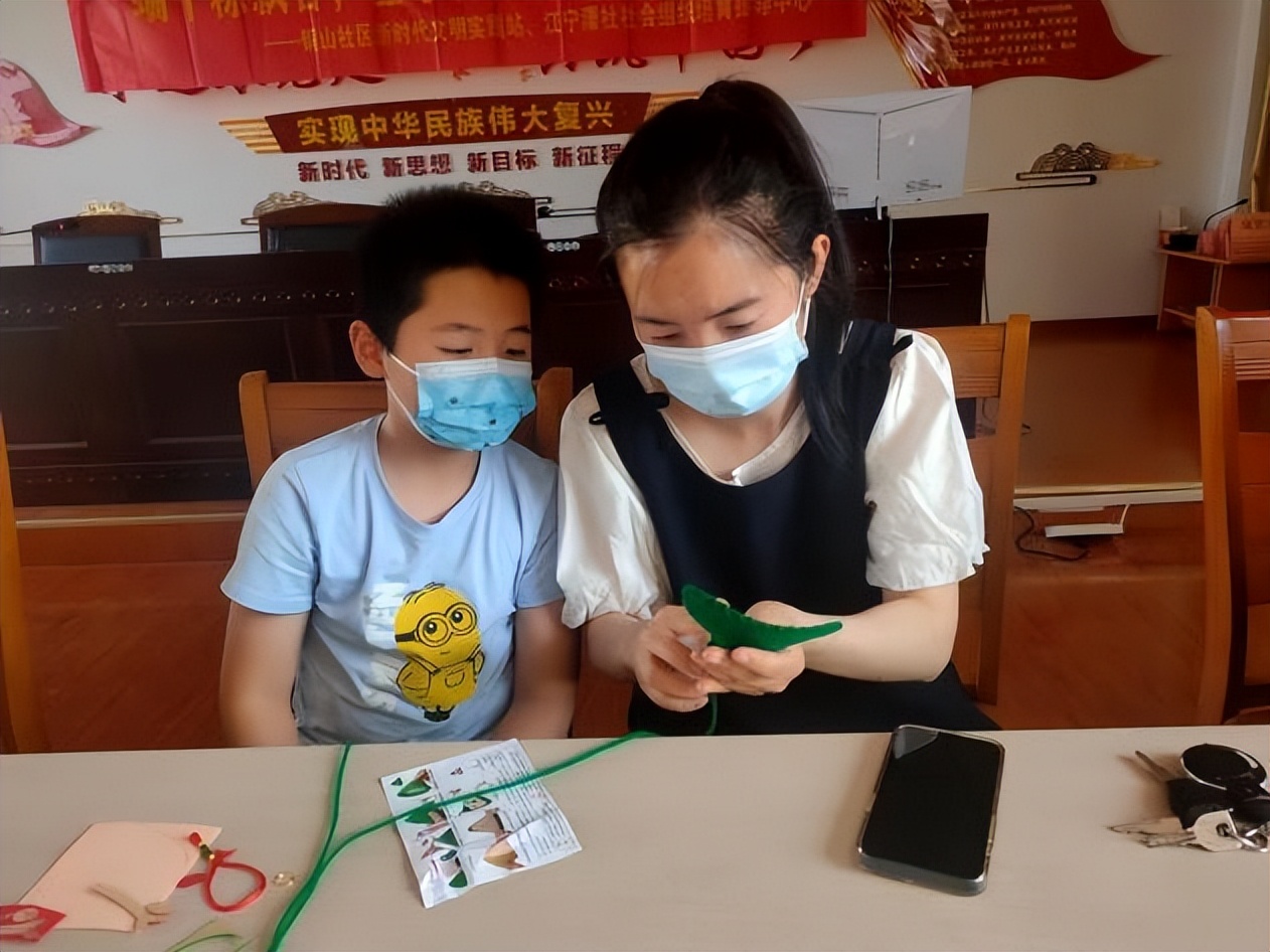 全市组织开展端午节文明实践活动,社区粽叶飘香品味端午活动主题