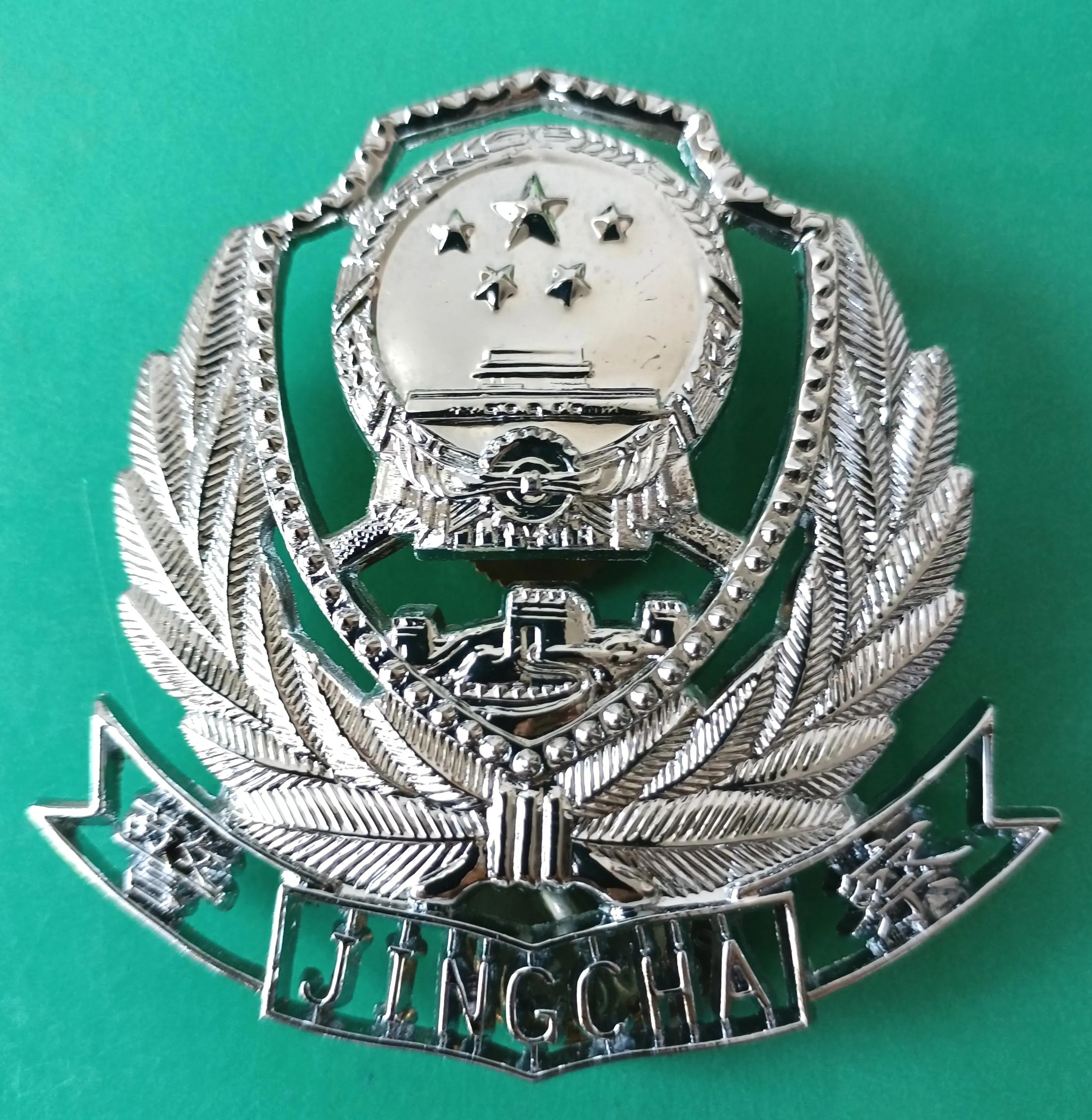 毛启国：*队军***警武**公安消防帽徽鉴赏