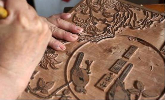 根雕雄狮三百万拒买照片,广西男子雕出15米雄狮