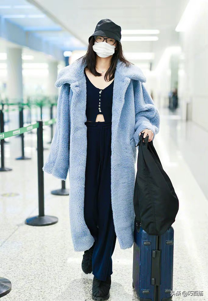 女明星爱穿大衣吗,为什么女明星喜欢穿西装