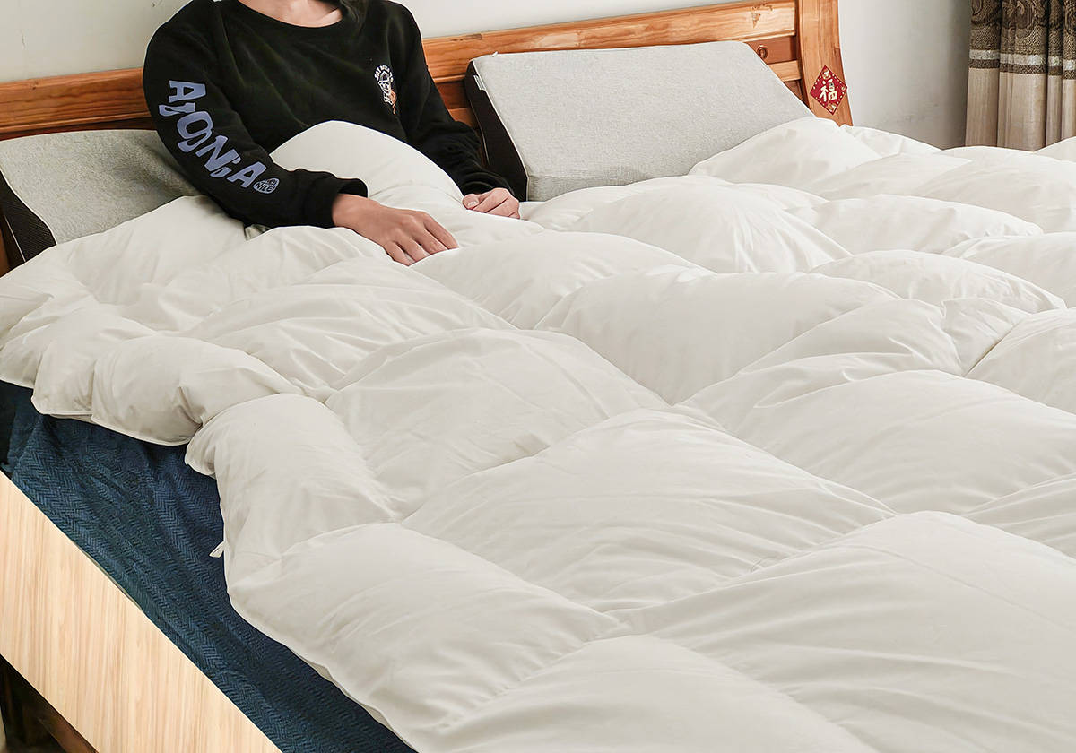 冬天盖鹅绒被暖和吗,夏天睡鹅绒被的体验