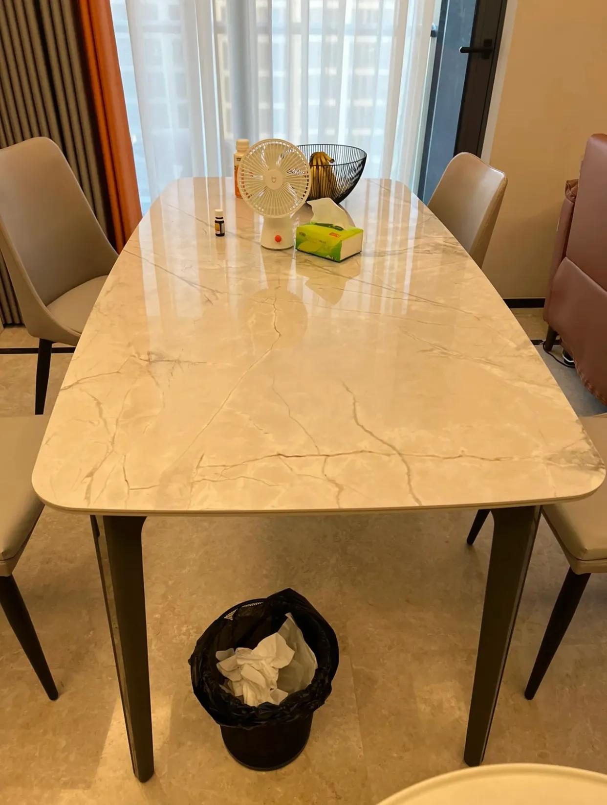 岩板餐桌跟天然石餐桌哪个好,七星石餐桌和岩板餐桌区别