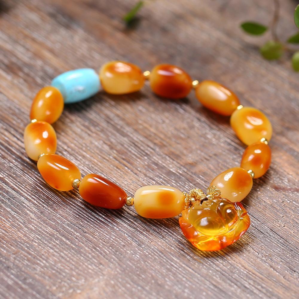 如何把玩琥珀蜜蜡手串变亮呢,琥珀蜜蜡手串适合女士吗