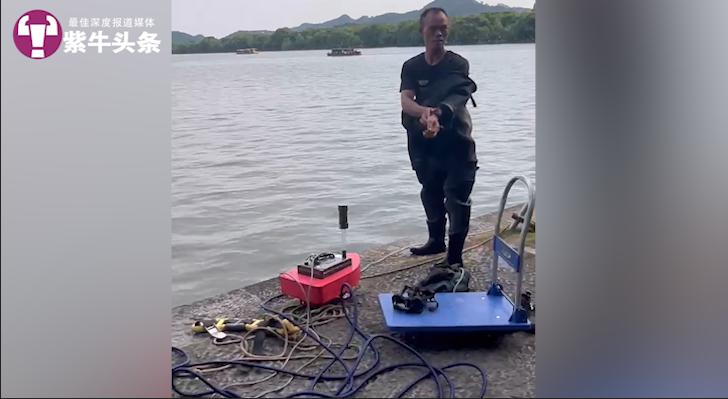 1500元西湖打捞手机,杭州西湖1500元手机打捞费